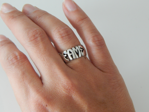 Personalized sterling silver name ring. Hand carved jewelry