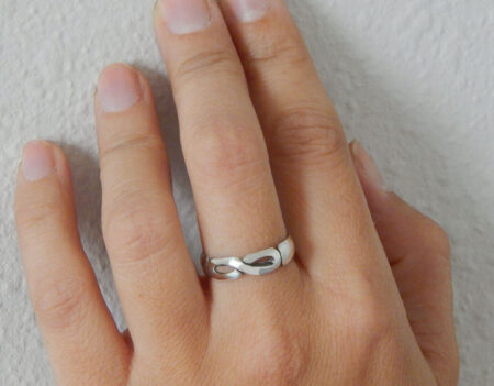 Sterling silver infinity ring. Hand carved jewelry