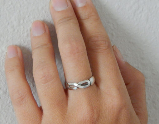 Sterling silver infinity ring. Hand carved jewelry